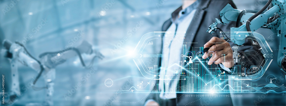 Poster Manager engineer analyzing and control automation robot arms machine on software modern virtual interface data real time in intelligent factory industrial and digital manufacturing operation.