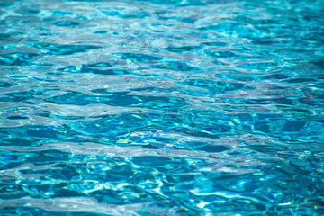 Tansparent clear calm water surface texture. Abstract nature background. Sea water pattern.