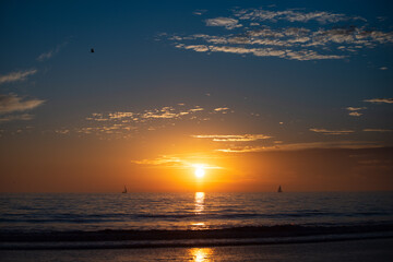 Sea beach with sunset sky abstract background. Copy space of summer vacation and travel concept.