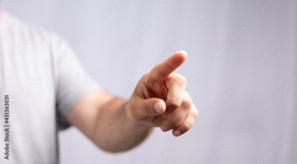 Poster Hand pushing on a touch screen..