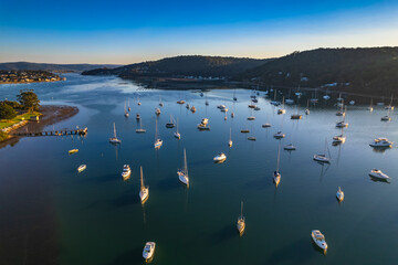 Early morning aerial waterscape with boats