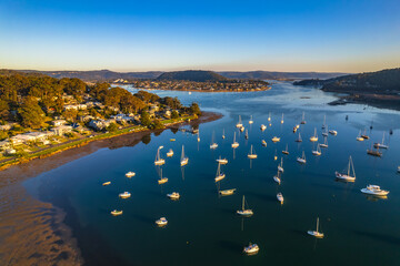 Early morning aerial waterscape with boats