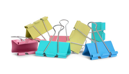 Colorful binder clips on white background. Stationery item