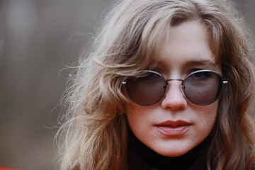 Fototapeta premium girl glasses autumn portrait, an adult woman glamorous autumn look