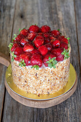 strawberry cake on wood background
