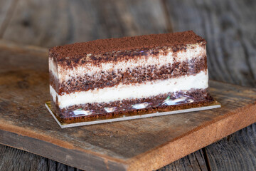tiramisu dessert on wood background