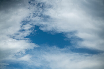 Cumulus clouds in the rays of the evening sun.