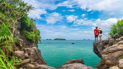 Couple traveler on cliff sea beach joy nature scenic panorama view landscape island, Adventure...