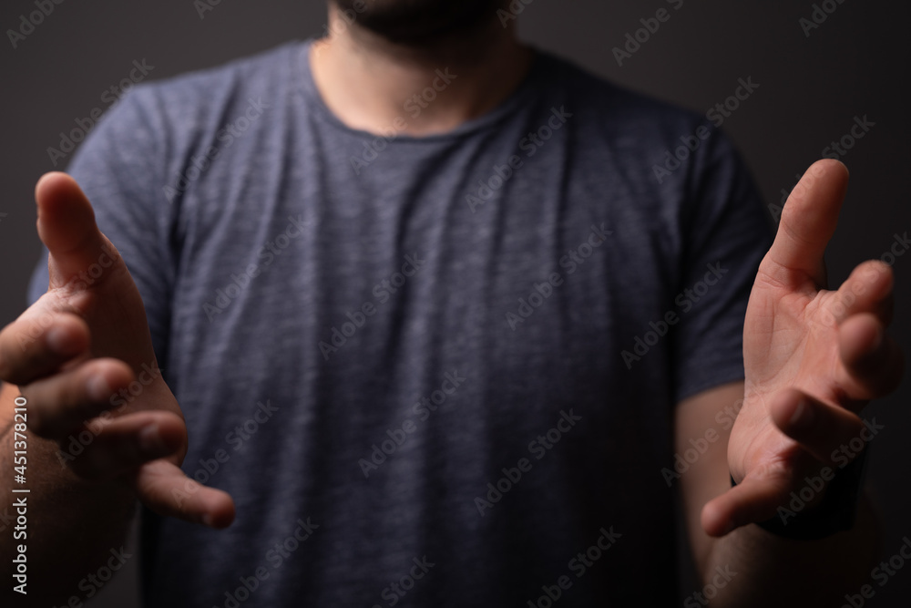 Poster man showing his empty hand.