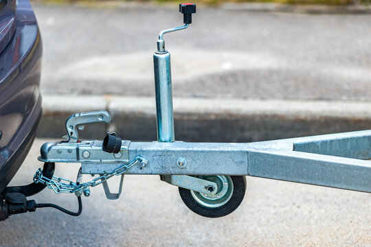 Trailer coupling device for towing a trailer by a passenger car. Cargo transportation and delivery business. Sale, rental and maintenance of trailers. Trailer driving safety concept.