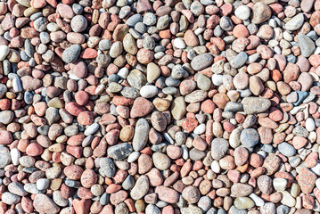 Natural colorful pebble background texture with copy space.Sea stone,Sea stones top view. Copy space.