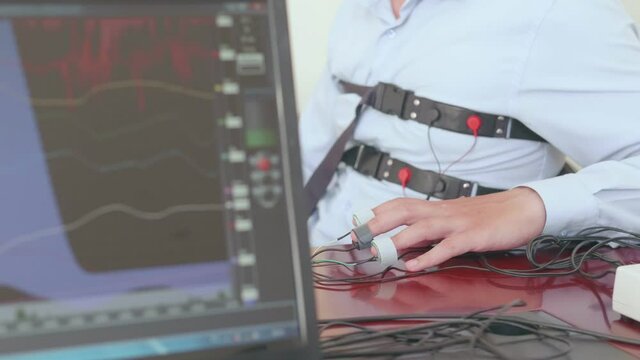 A man is tested on a polygraph