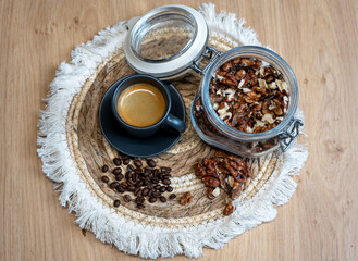 Obraz na płótnie Canvas coffee time with walnuts and coffee beans beautiful soft brown tones