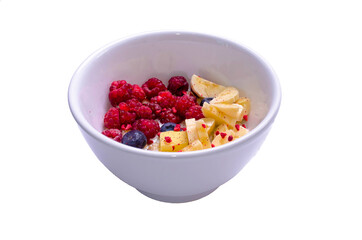 porridge with blueberries raspberries and banana on a white background