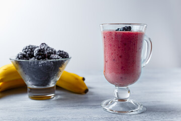 Banana-blackberry smoothie made from frozen fruits.