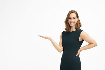 Beautiful young woman holding a product at the palms and looks happy