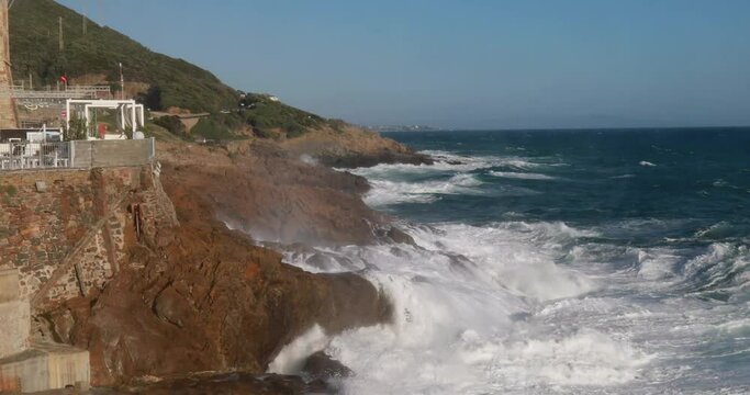 view on the tower of Calafuria Livorno Tuscany with rough sea