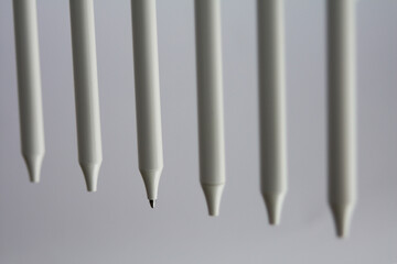 pens on a white