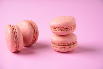 Colorful macarons cakes. Small French cakes. Sweet and colorful french macaroons, colorful almond cookies, pastel colors