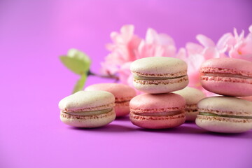 Colorful macarons cakes. Small French cakes. Sweet and colorful french macaroons, colorful almond cookies, pastel colors