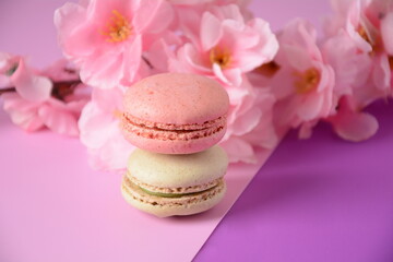 Colorful macarons cakes. Small French cakes. Sweet and colorful french macaroons, colorful almond cookies, pastel colors