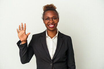 Young business african american woman isolated on white background smiling cheerful showing number five with fingers.