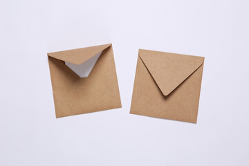 Craft envelopes on white background. Top view