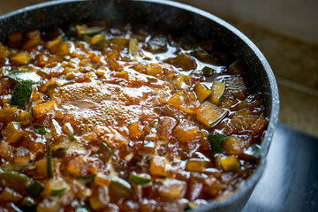 The steps for making winter melon tea, the winter melon grains and brown sugar are boiled in a pot