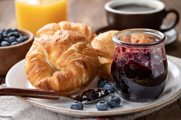 Croissants with blueberry jam and blueberries
