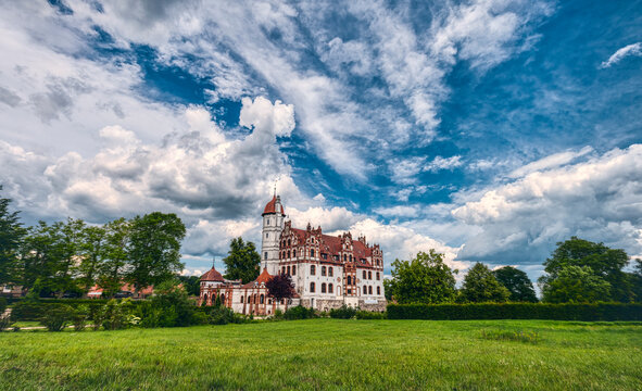 basedow castle in mecklenburg western pomerania with a dramatic sky