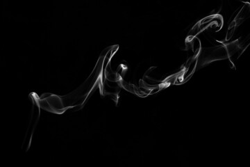 Smoke, clouds in a black background.
