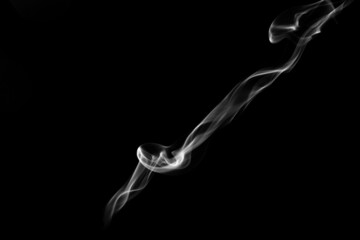 Smoke, clouds in a black background.