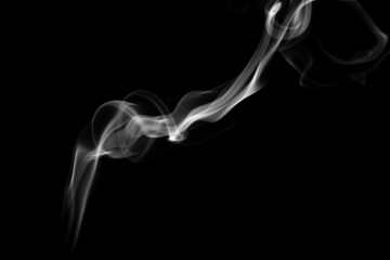 Smoke, clouds in a black background.