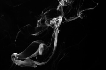 Smoke, clouds in a black background.
