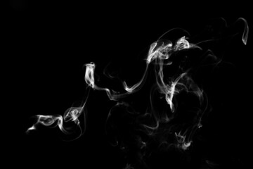 Smoke, clouds in a black background.