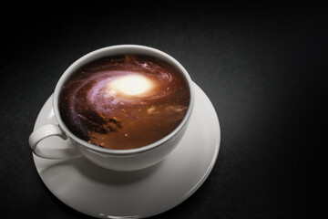 Stars and galaxies in a cup. Abstract photography.