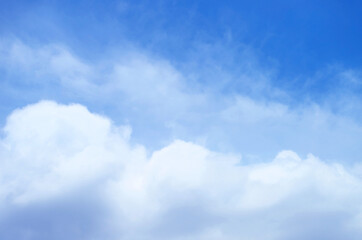 Fluffy White Cumulus Clouds on Vibrant Blue Sky