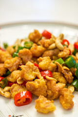 A delicious Chinese dish, deep-fried chicken paw with salt and pepper