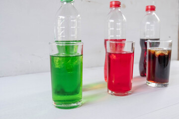 soft drink in a glass on a white background