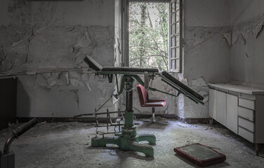a bed for people with mental problems, inside an abandoned asylum, in italy.
