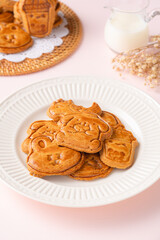 Mooncake biscuits are little sweet snacks which are like the outer layer of the mooncake. Unlike the traditional baked mooncakes, these biscuits are usually made without filling and are much thicker.