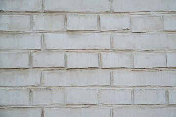 White grunge brick wall background. Cracked White Brick Wall. White Stone Wall.