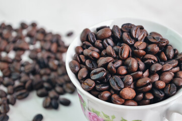 Bunch of coffee bean brown roasted isolated on a white background