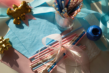 Baby shower. Boy or girl concept, birth child, gender reveal party, decor and treats. Top view. Copy space
