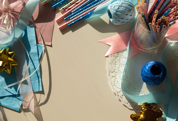 Decor for gender reveal party, birth child baby shower concept boy or girl, top view. He or she