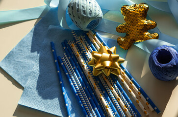Decor for gender reveal party, birth child baby shower concept baby boy only top view