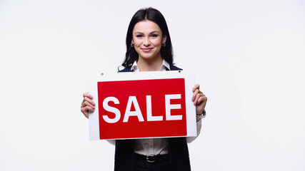 Broker in formal wear holding signboard with sale lettering isolated on white.