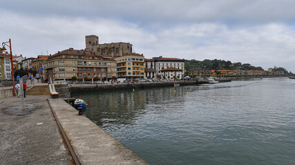 Obraz premium Zumaia, Spain - 14 August 2021: Traditional Basque buildings in the port town of Zumaia