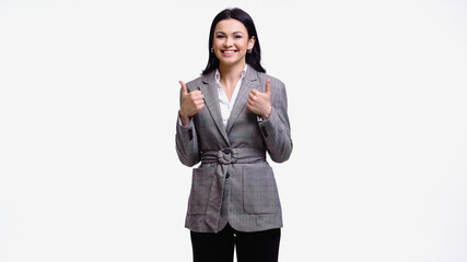 Smiling manager in formal wear showing thumbs up isolated on white.