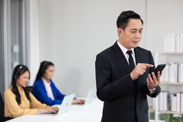 senior businessman chatting conversation on smartphone for work at call center service